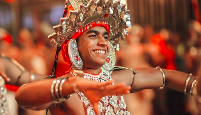 Kandyan dancer with a smiling face